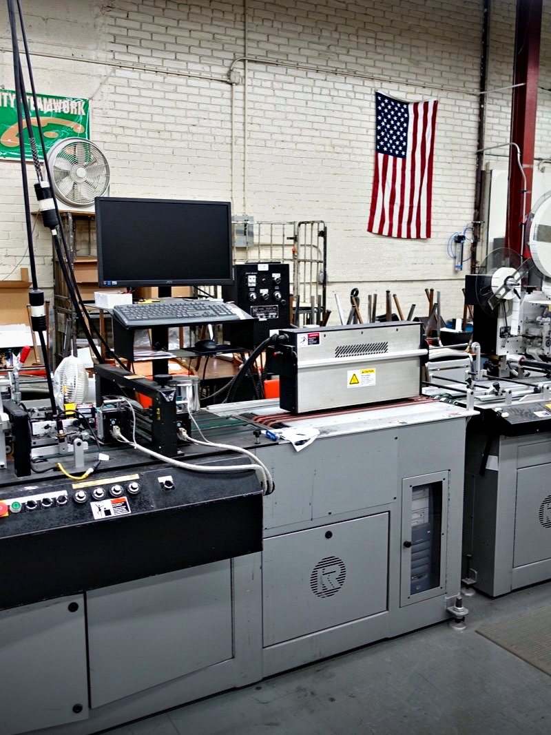 The inserting and addressing line running a mailing at Broudy Printing